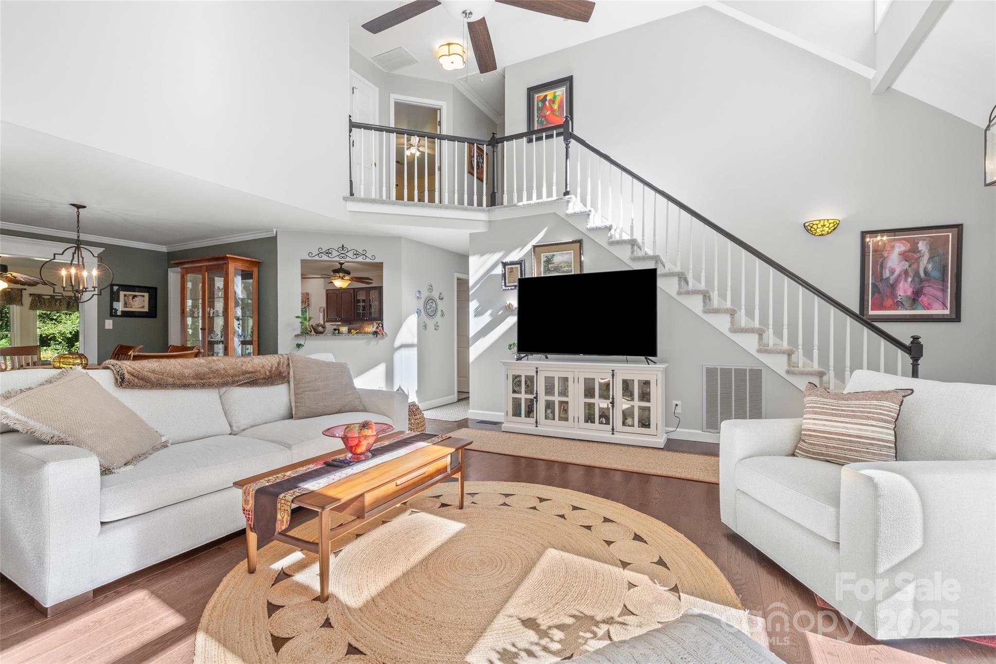 1326 Clifflure Lane Fort Mill, SC 29708 - Photo 8 of 47 a living room with furniture and a flat screen tv