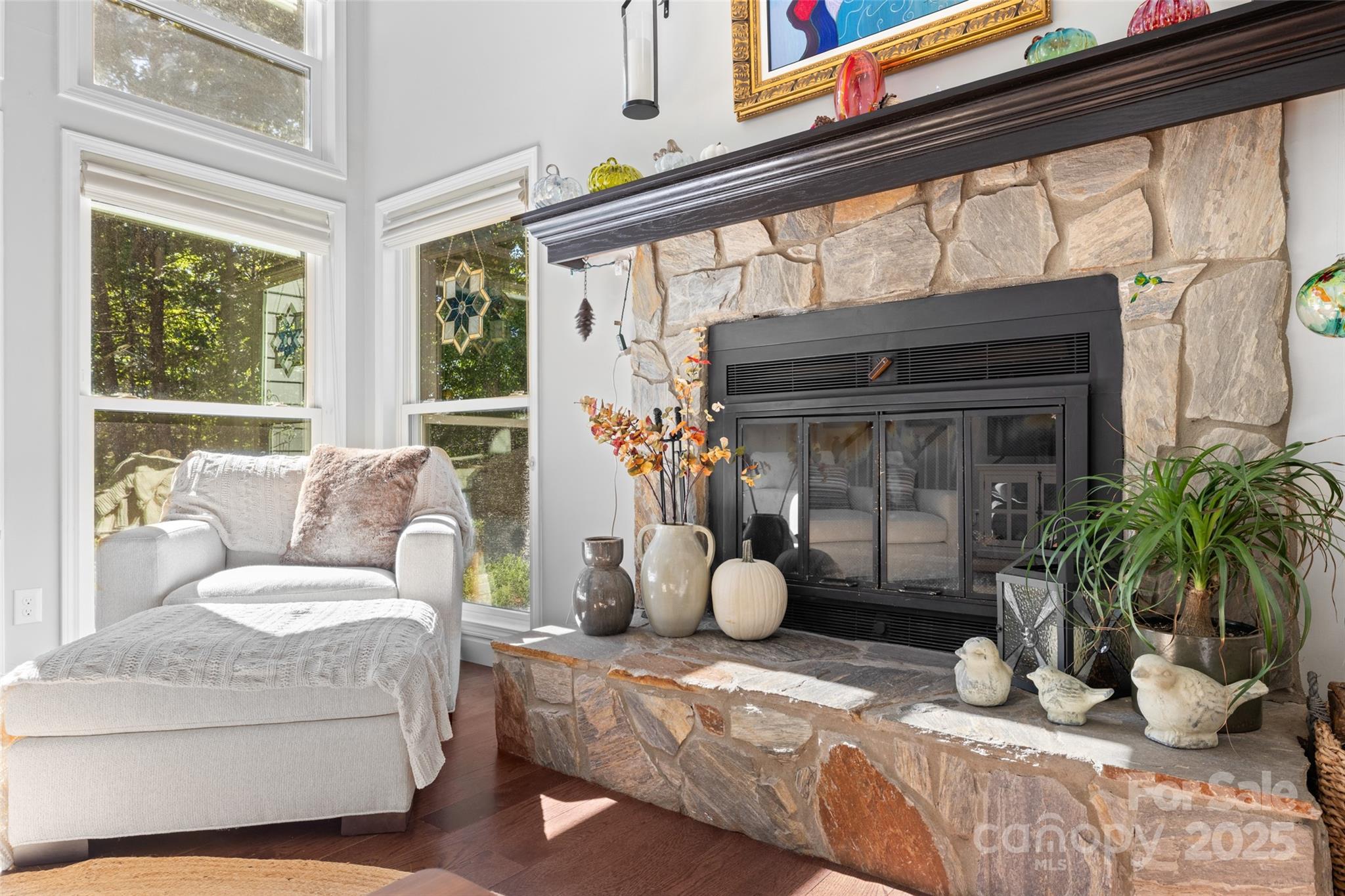 1326 Clifflure Lane Fort Mill, SC 29708 - Photo 9 of 47 a living room with furniture a window and a fireplace