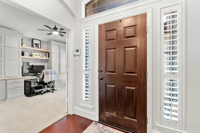 a view of a livingroom with a flat screen tv