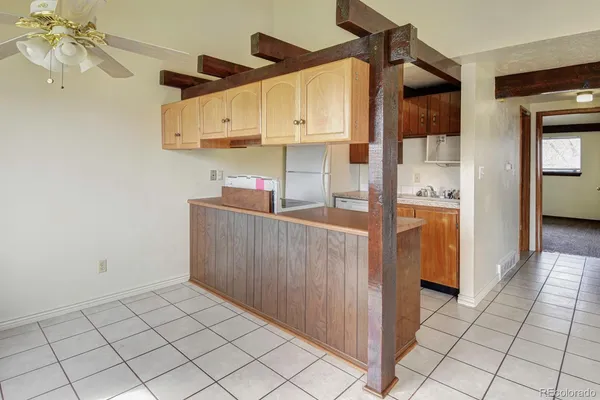 a view of a livingroom with wooden floor