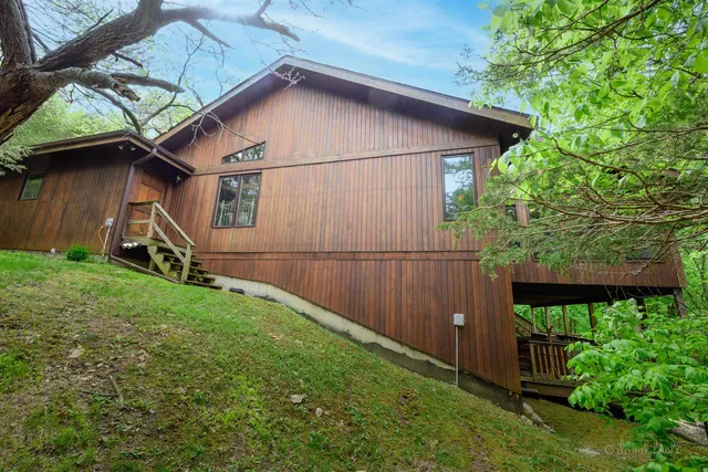 a house with trees in the background