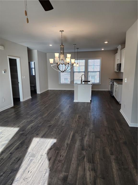 3765 Davis Circle Duluth, GA 30096 - Photo 5 of 8 a view of a livingroom with furniture and wooden floor