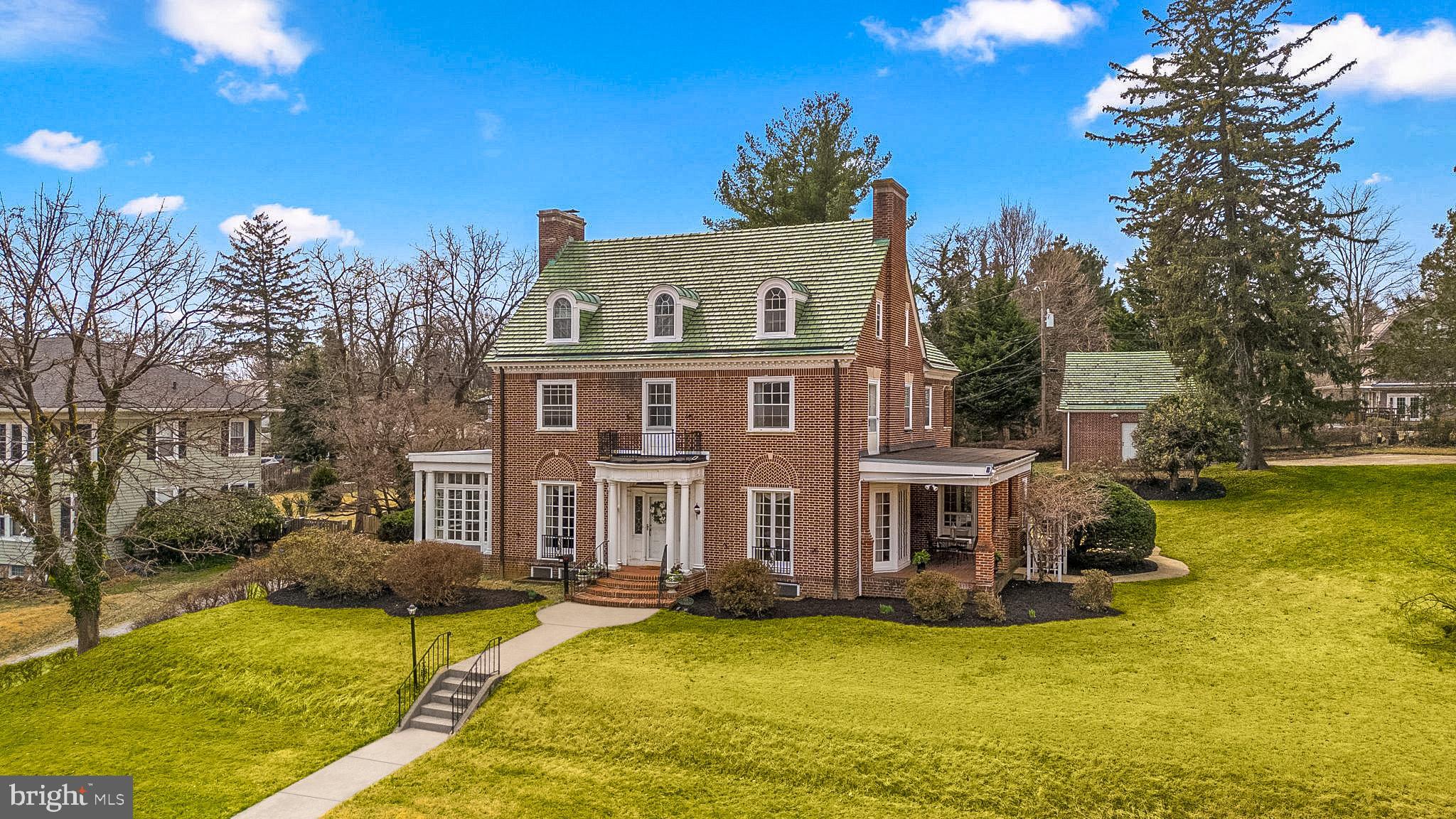 414 Old Orchard Road Baltimore, MD 21229 - Photo 4 of 84 a view of a house with swimming pool next to a yard