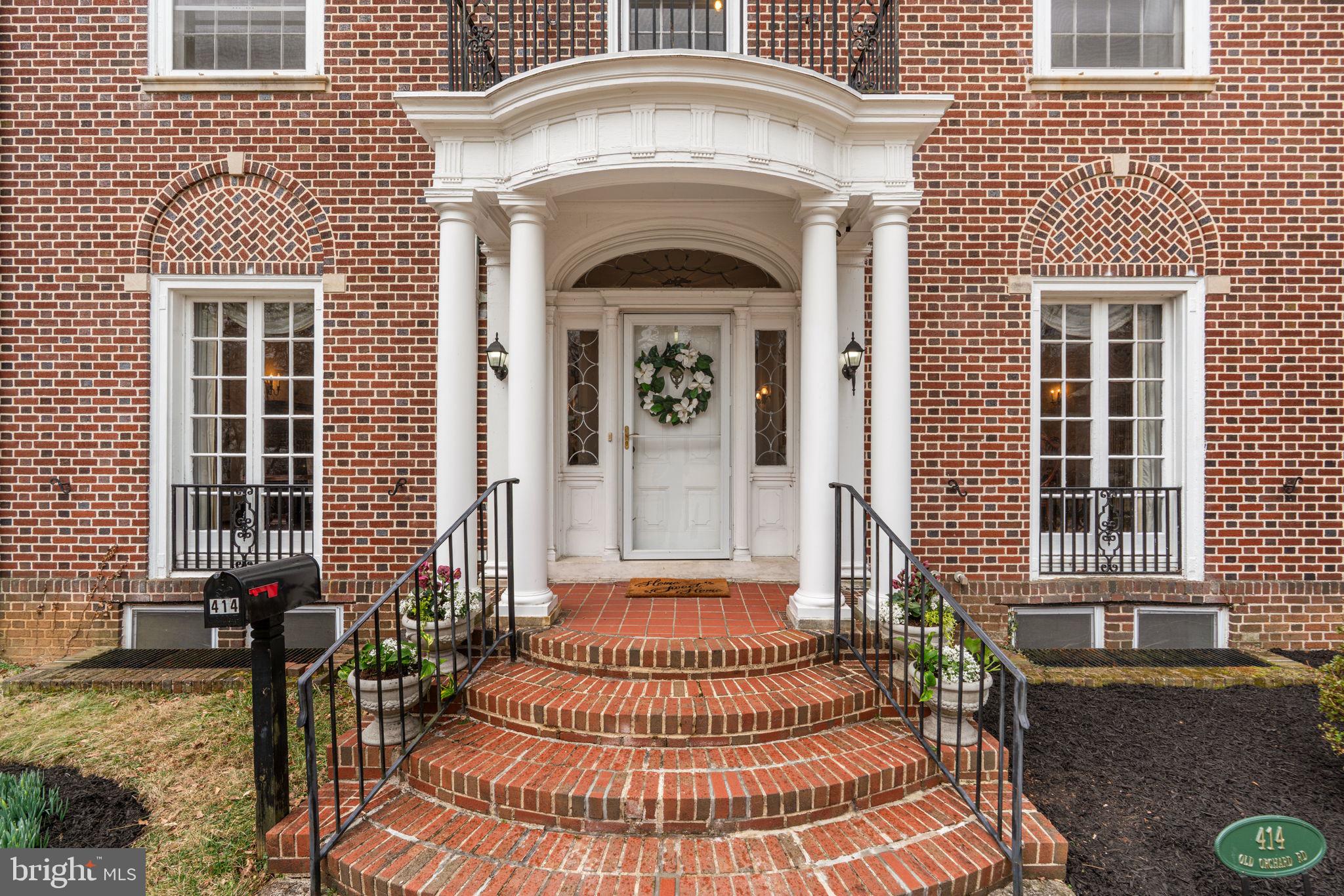 414 Old Orchard Road Baltimore, MD 21229 - Photo 5 of 84 a front view of a house with a garden