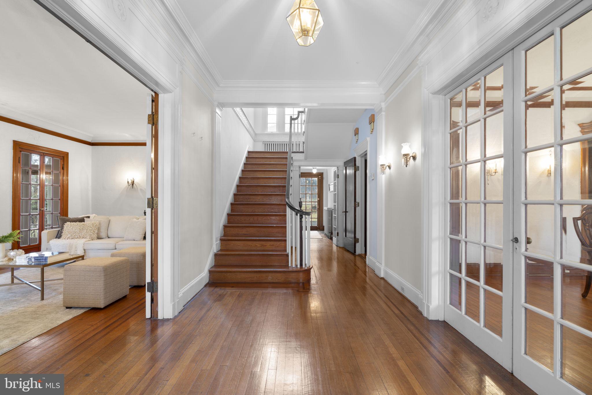 414 Old Orchard Road Baltimore, MD 21229 - Photo 6 of 84 a view of a bedroom with wooden floor and windows