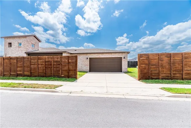 a house view with a garden space