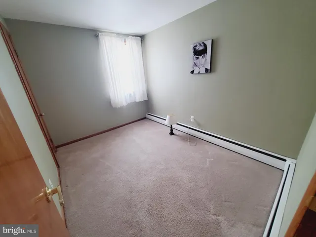 a view of a room with rack on the wall