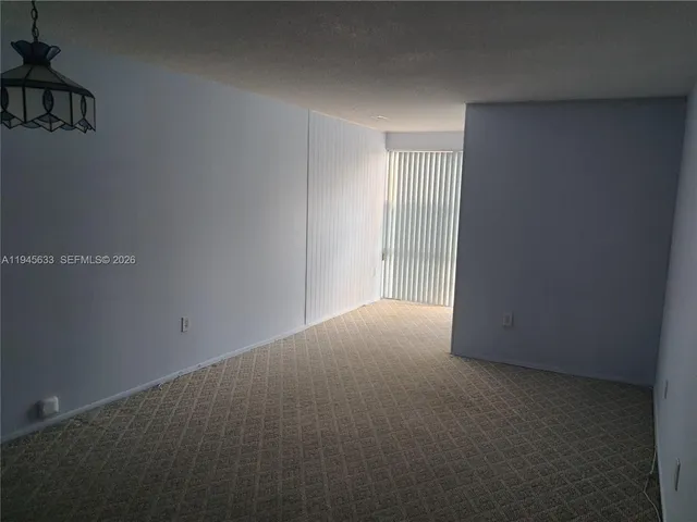 a bathroom with a sink toilet and mirror