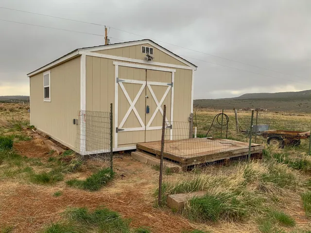 a front view of a house with swimming pool