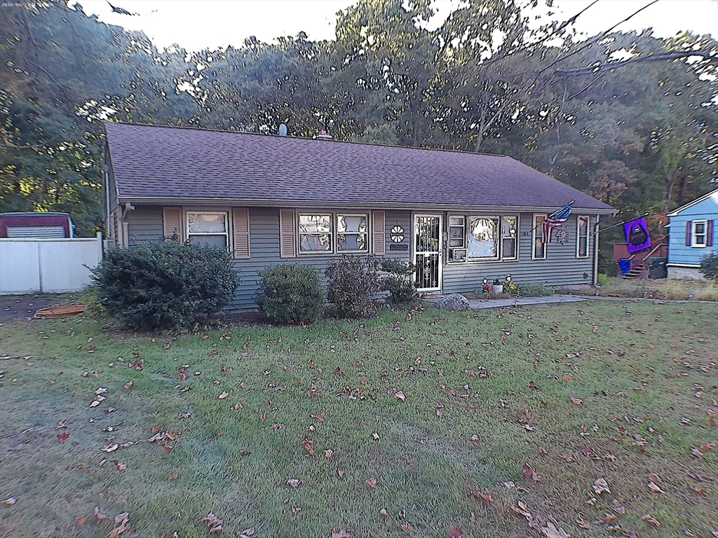88 Old Farm Road Springfield, MA 01119 - Photo 1 of 16 a view of a house with a yard