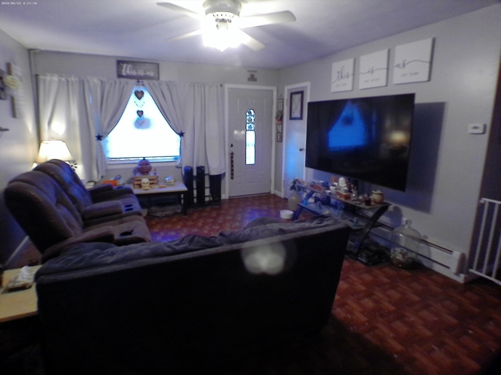 88 Old Farm Road Springfield, MA 01119 - Photo 6 of 16 a living room with furniture and a flat screen tv