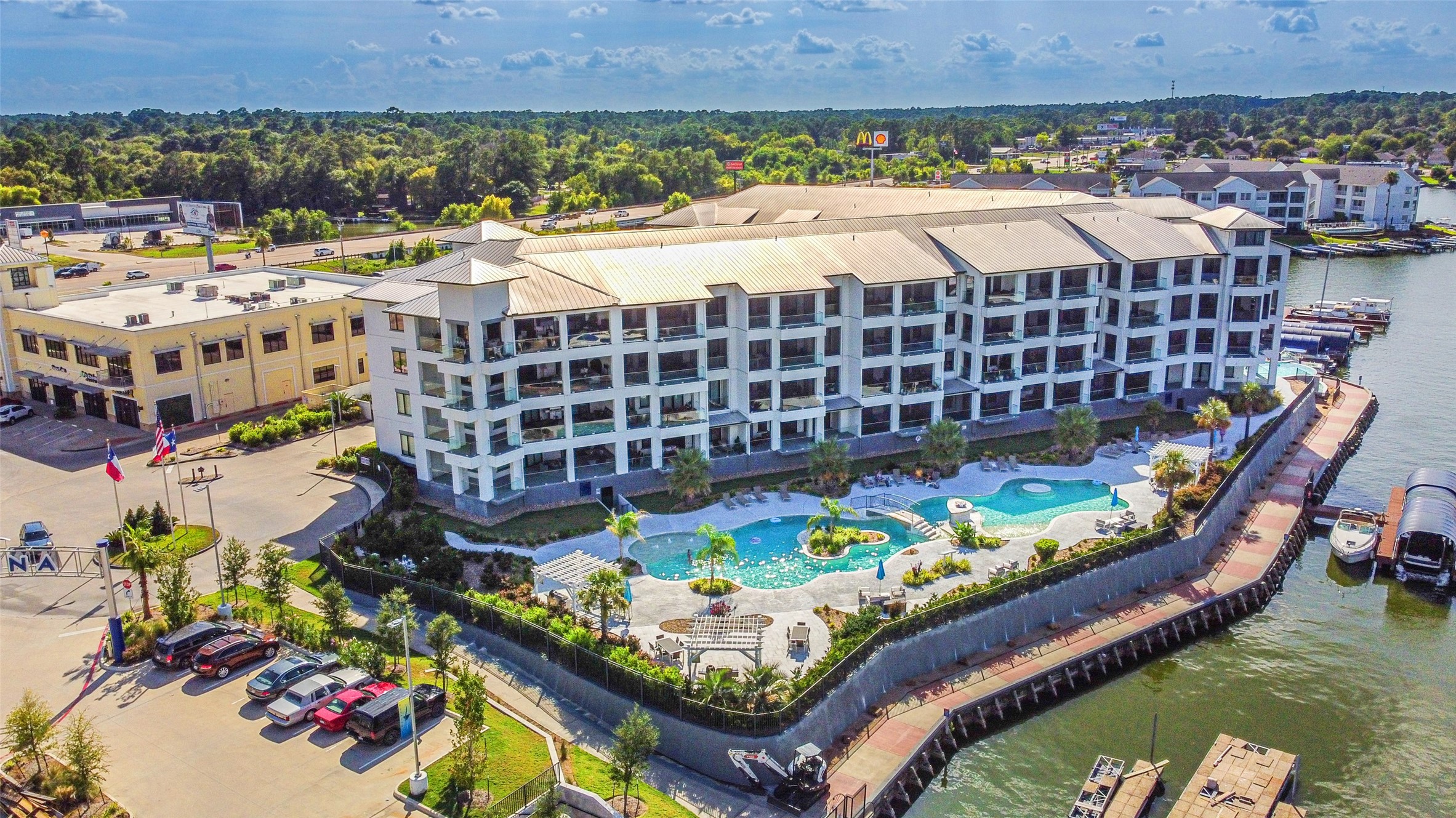 199 Waterpoint Court, Unit 106 Conroe, TX 77304 - Photo 1 of 50 Built in 2019 but Unit 106 was purchased in April of 2022--barely lived in.