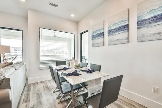 a kitchen with a sink cabinets and stainless steel appliances
