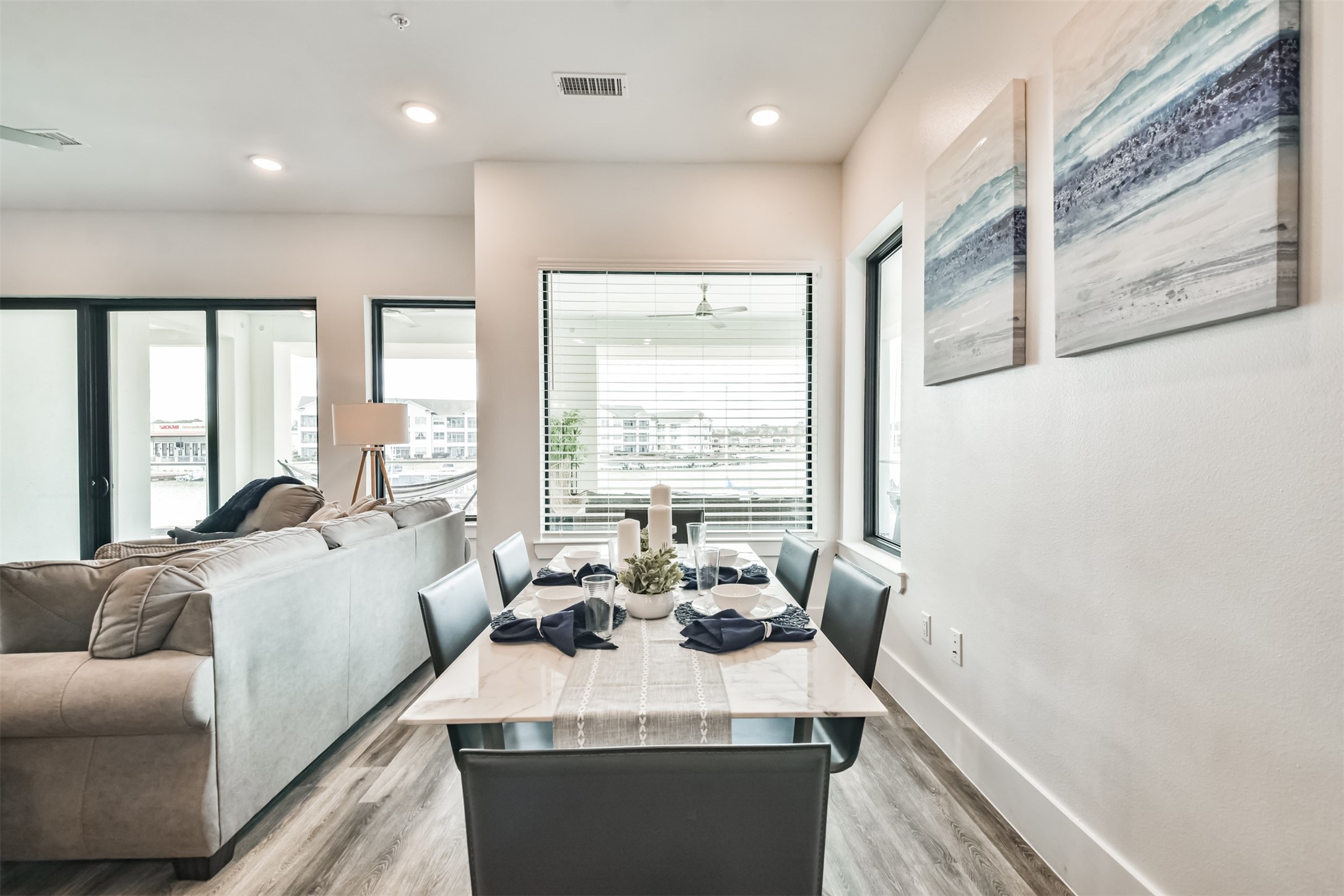 199 Waterpoint Court, Unit 106 Conroe, TX 77304 - Photo 19 of 50 Dining room can accommodate larger table and chairs if necessary.