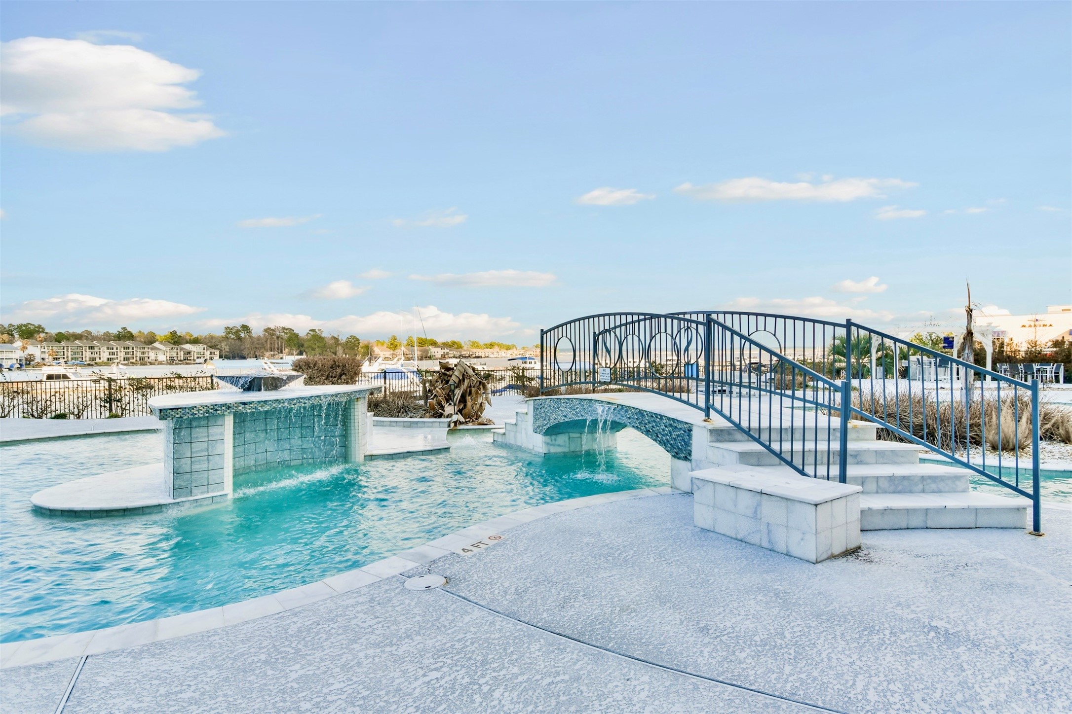 199 Waterpoint Court, Unit 106 Conroe, TX 77304 - Photo 43 of 50 a view of a terrace with a lake view