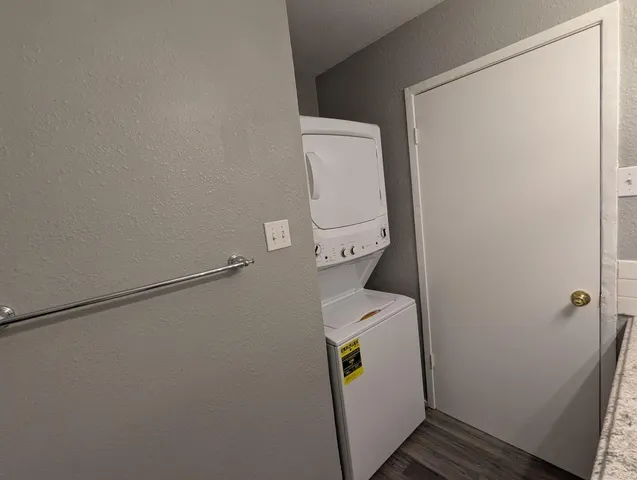 a utility room with dryer and washer