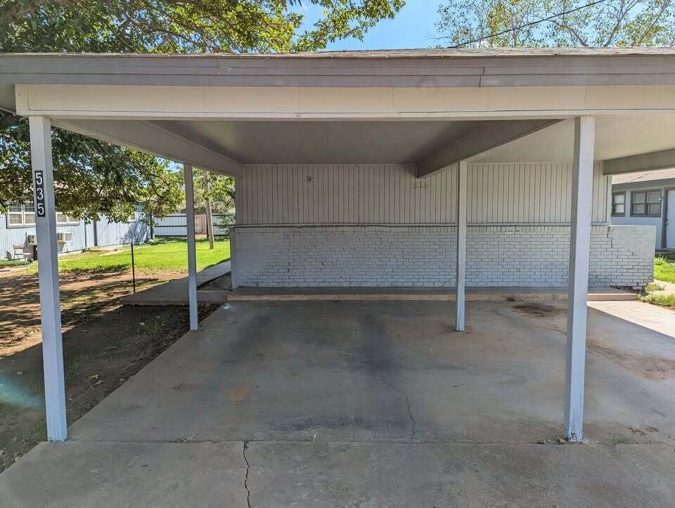 535 42nd Street, Unit A & B Lubbock, TX 79404 - Photo 2 of 13 a view of an empty room with a floor to ceiling window