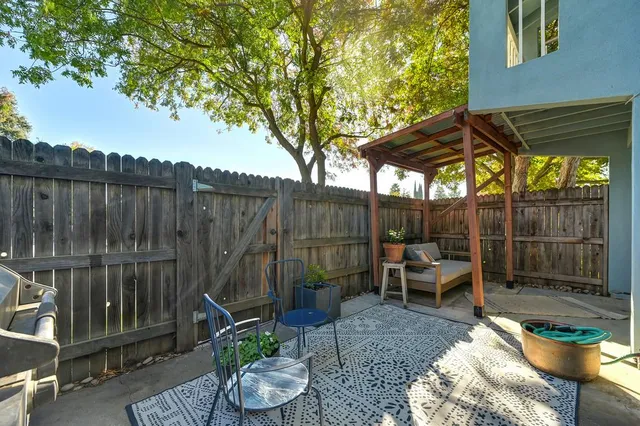 a view of a backyard with a patio