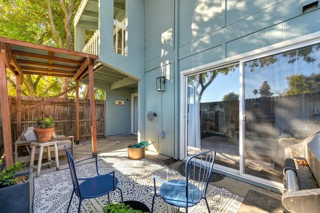 a outdoor space with patio the view and a potted plant