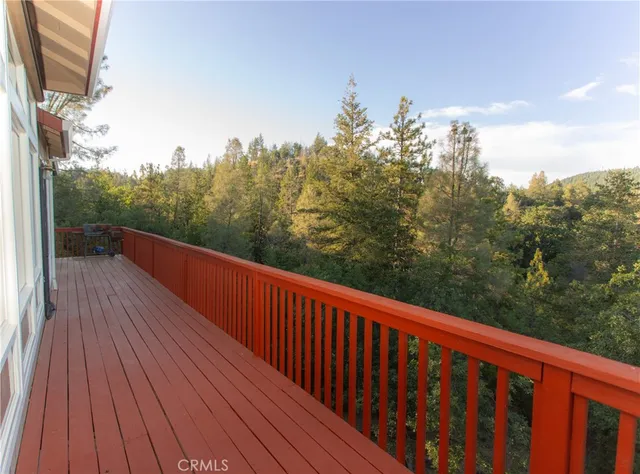 a balcony with an outdoor space