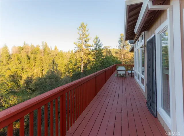 a view of balcony with furniture