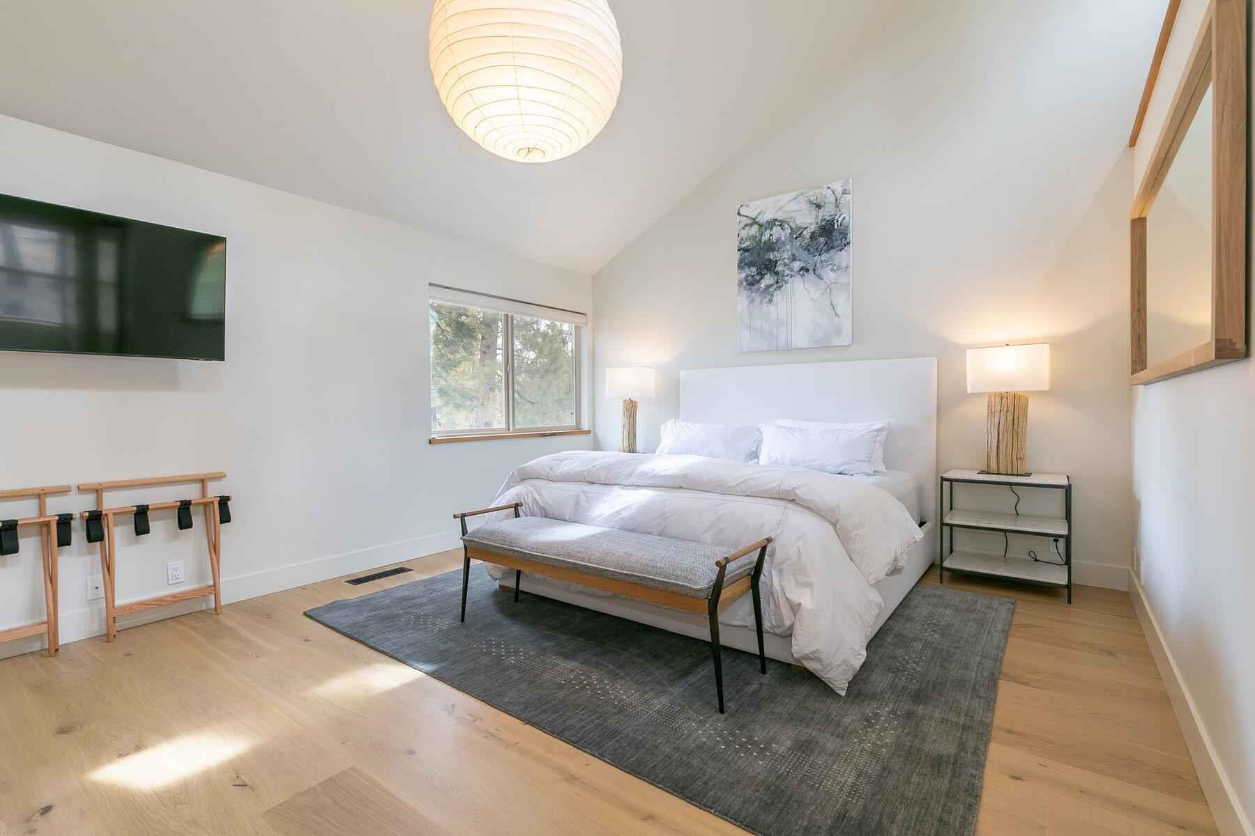 237 Basque Drive Truckee, CA 96161 - Photo 21 of 23 a bed room with a bed and a television