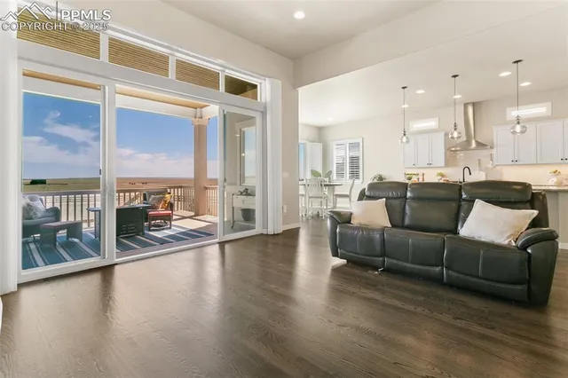 a view of a living room or kitchen with a large window