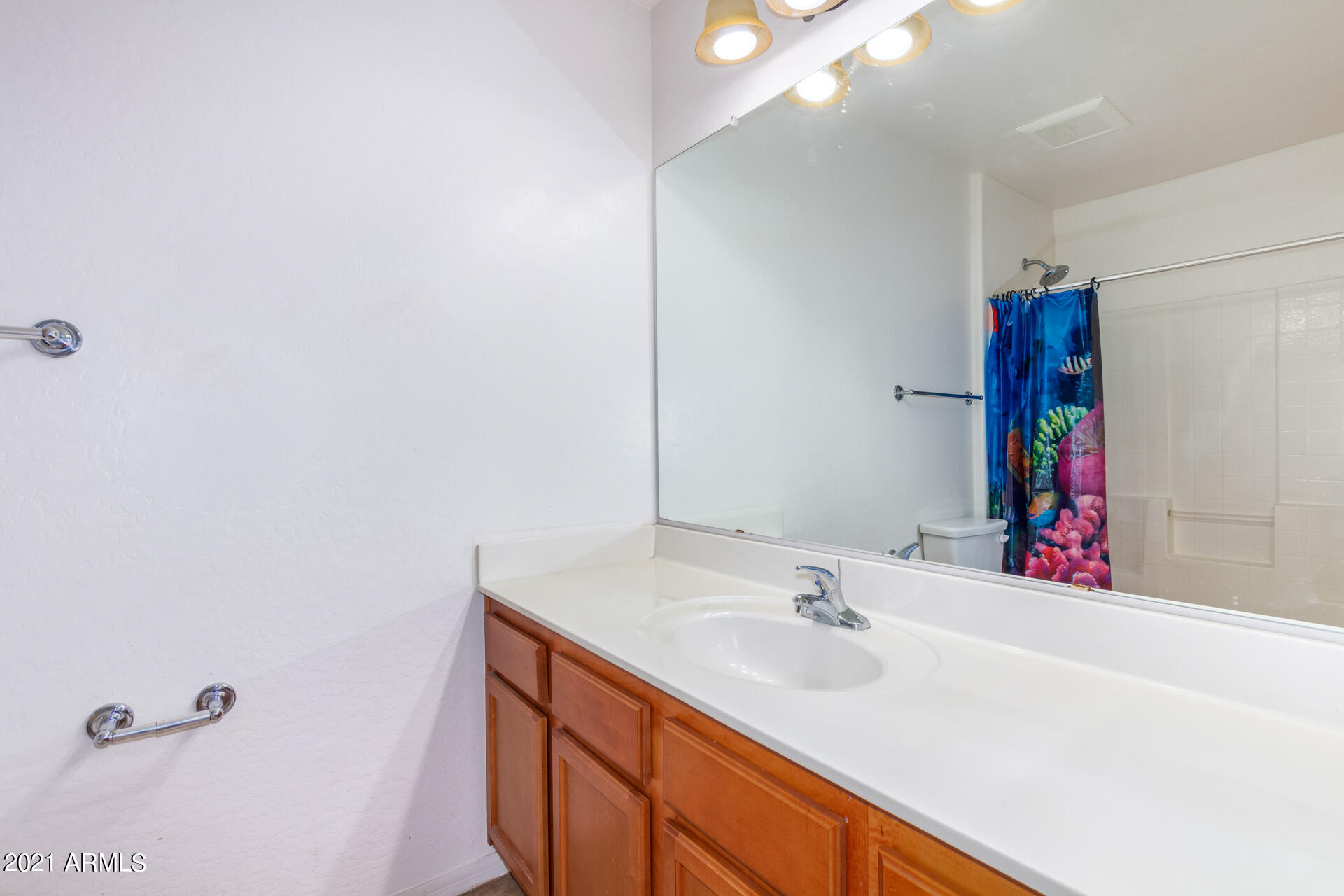 3716 West Fremont Rd. Phoenix, AZ 85041 - Photo 29 of 32 28-Hallway bath vanityFremont