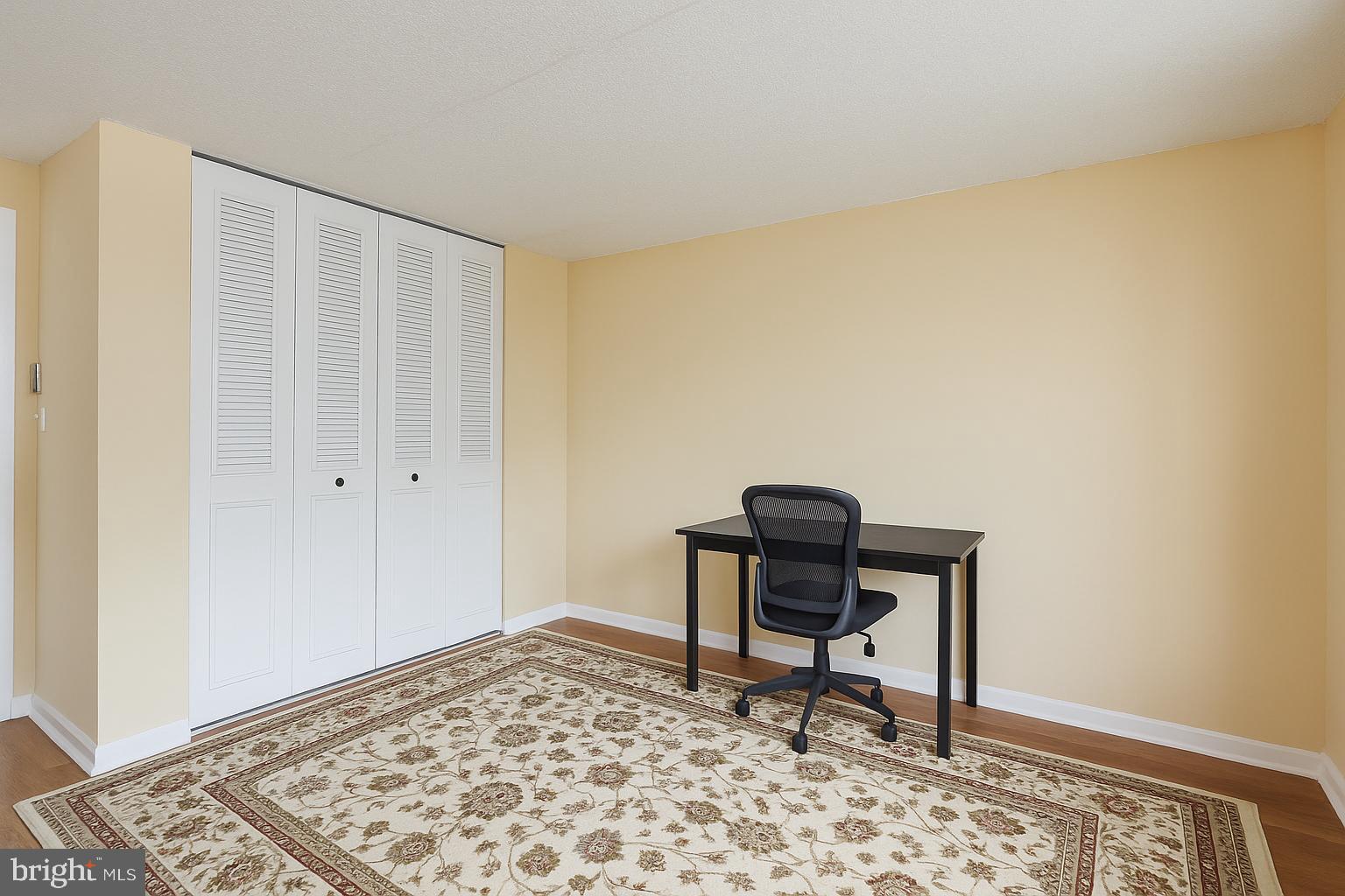 860 Lower Ferry Road, Unit 2C Ewing, NJ 08628 - Photo 18 of 19 a chair in a room