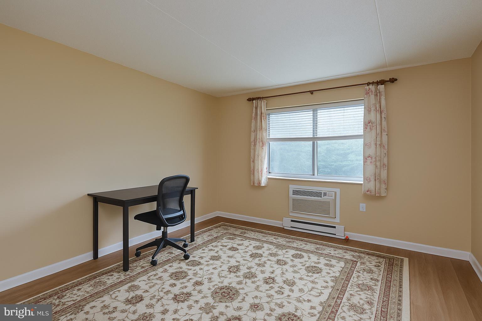 860 Lower Ferry Road, Unit 2C Ewing, NJ 08628 - Photo 19 of 19 a workspace with wooden floor and a window