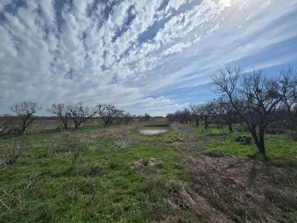 a view of a lake with beach and lake view