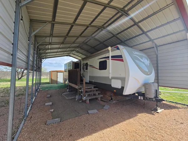 a view of a porch with chairs
