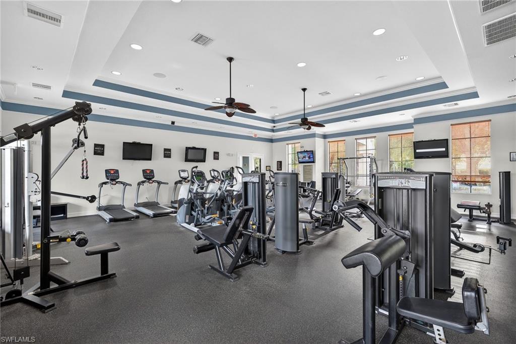 7845 Bristol Circle Naples, FL 34120 - Photo 28 of 31 a view of a room with gym equipment
