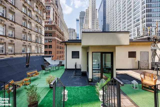 front view of a building with a yard