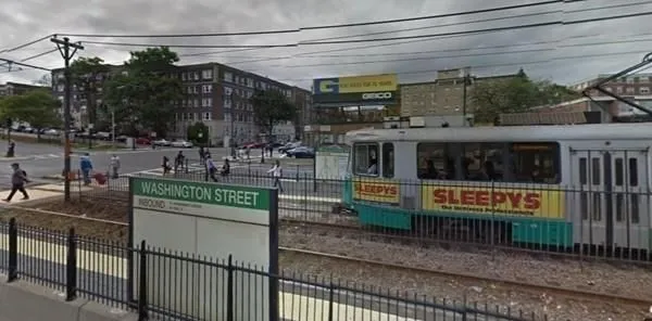 a view of a building with sitting area