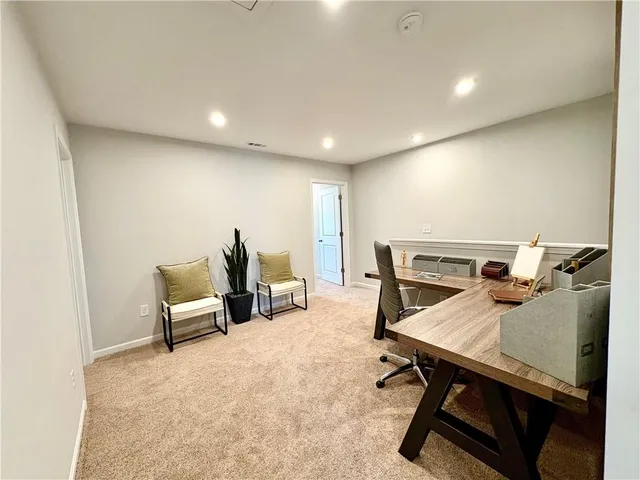 a bedroom with furniture and a window