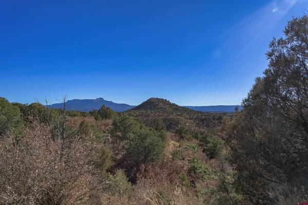 a view of mountain view with mountains in the background
