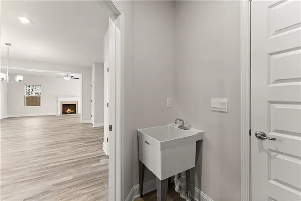 a bathroom with a sink and mirror