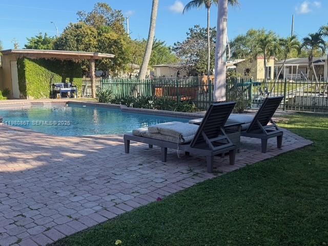 10720 Southwest 43rd Lane Miami, FL 33165 - Photo 4 of 16 a view of a house with backyard and sitting area