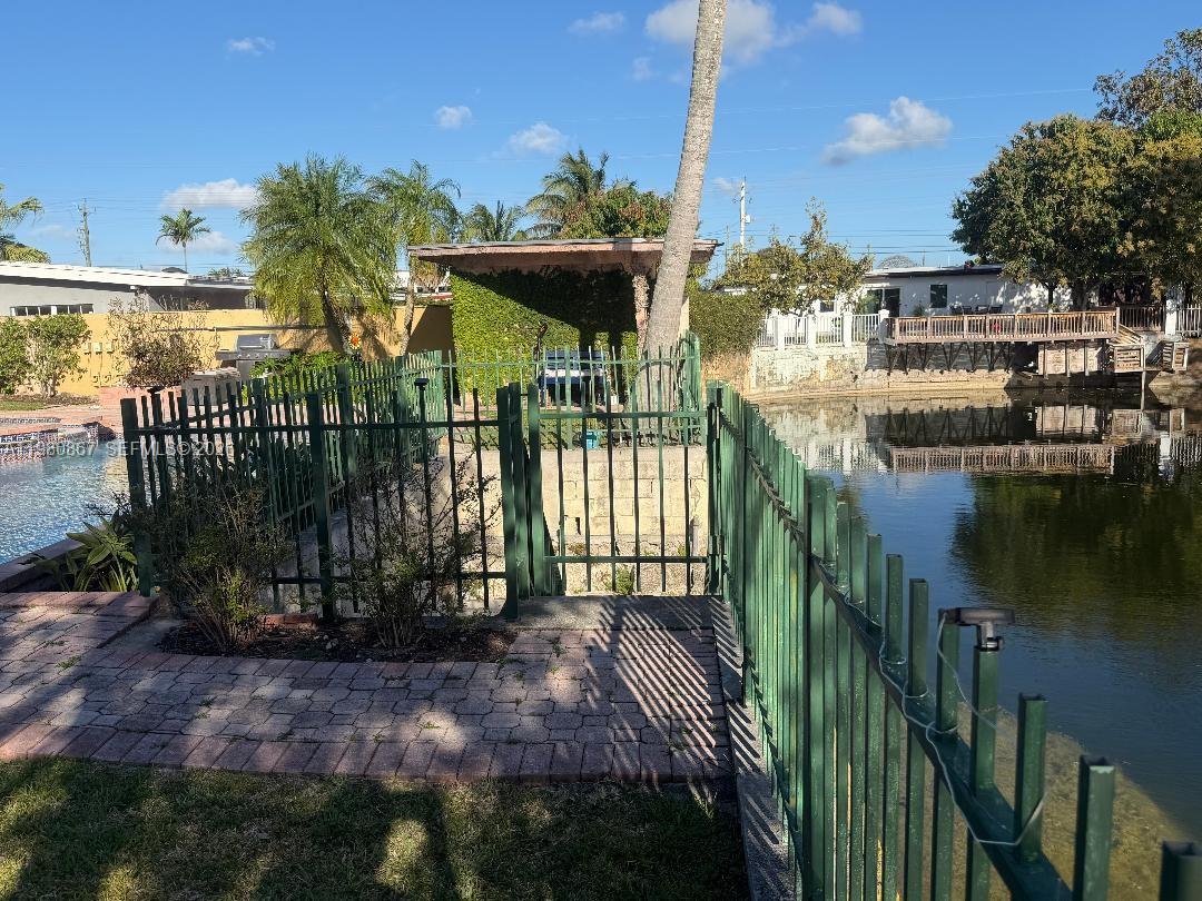 10720 Southwest 43rd Lane Miami, FL 33165 - Photo 7 of 16 a view of a house with a porch