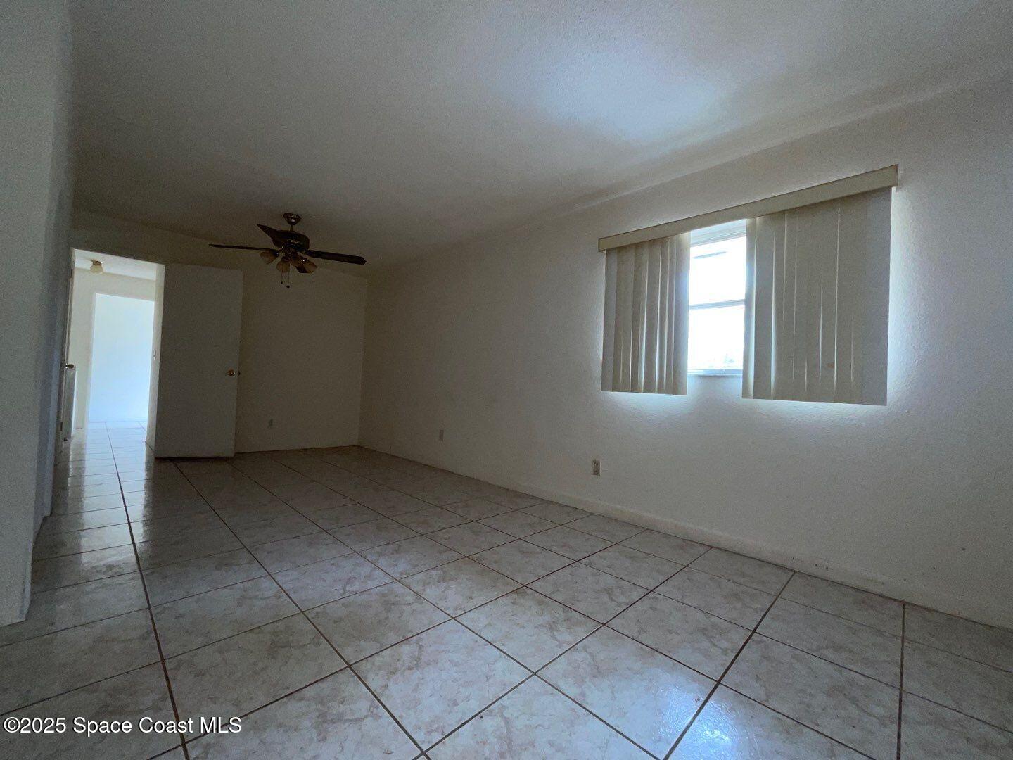 617 Walker Street Melbourne, FL 32901 - Photo 14 of 38 an empty room with windows