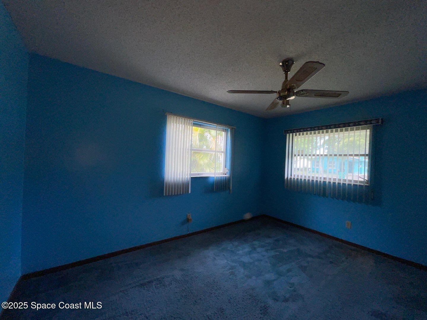 617 Walker Street Melbourne, FL 32901 - Photo 26 of 38 a view of an empty room with a window
