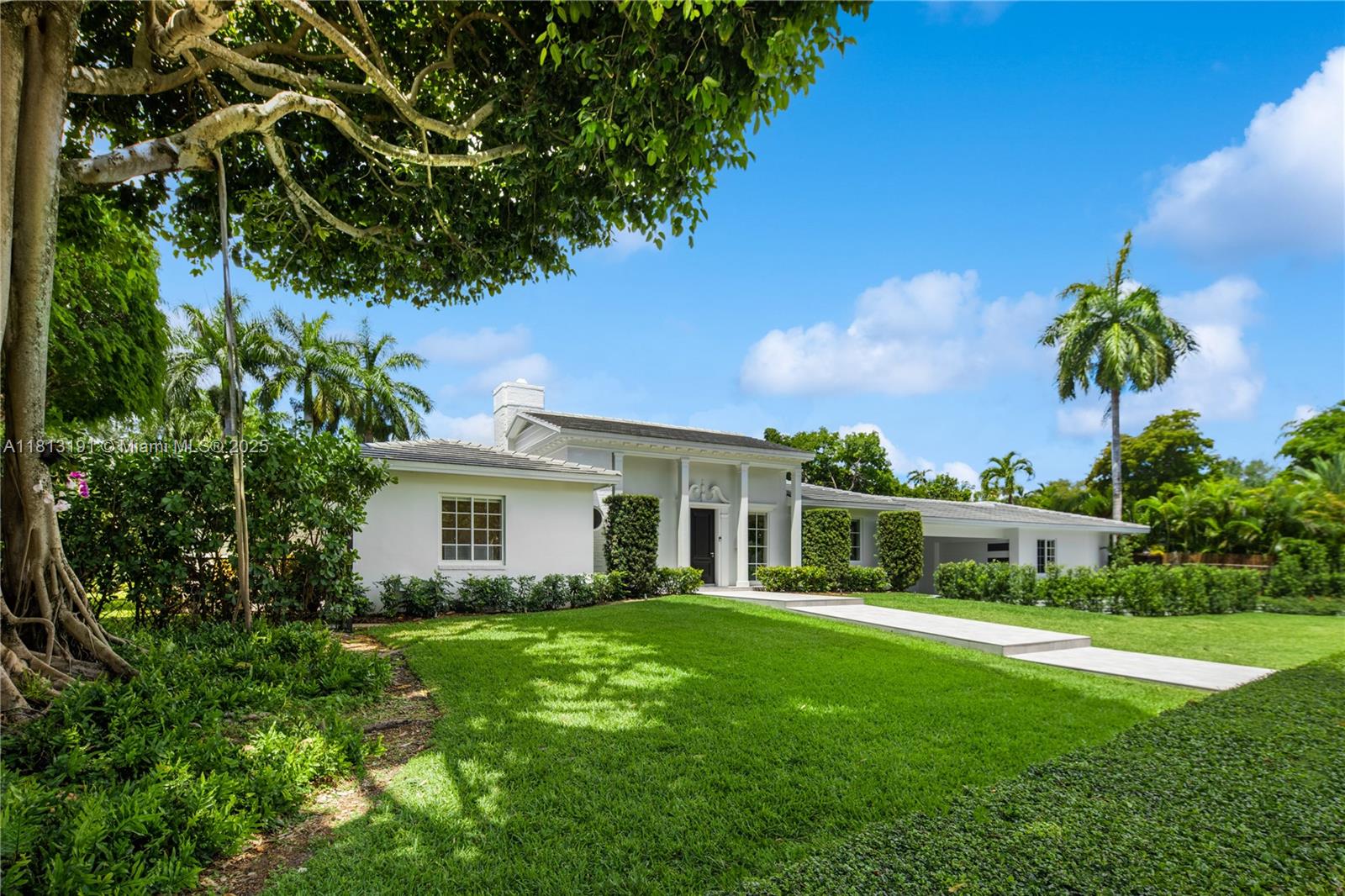 4380 Lake Road Miami, FL 33137 - Photo 16 of 41 a view of house with backyard
