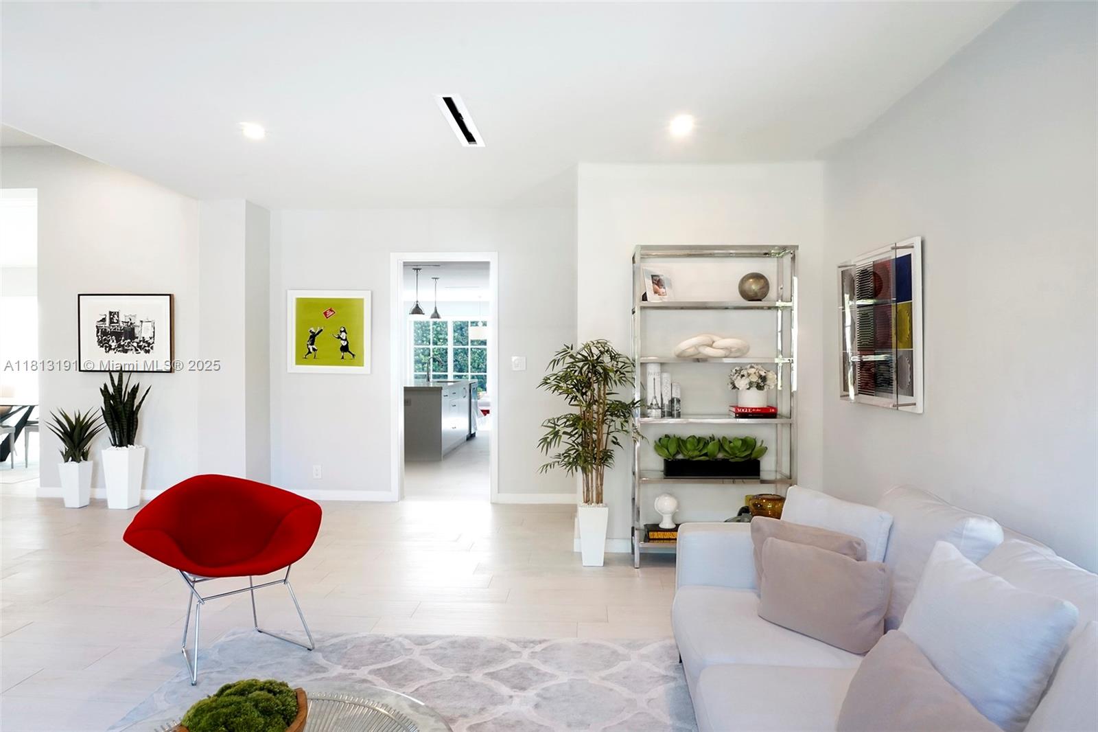 4380 Lake Road Miami, FL 33137 - Photo 20 of 41 a living room with furniture and a table