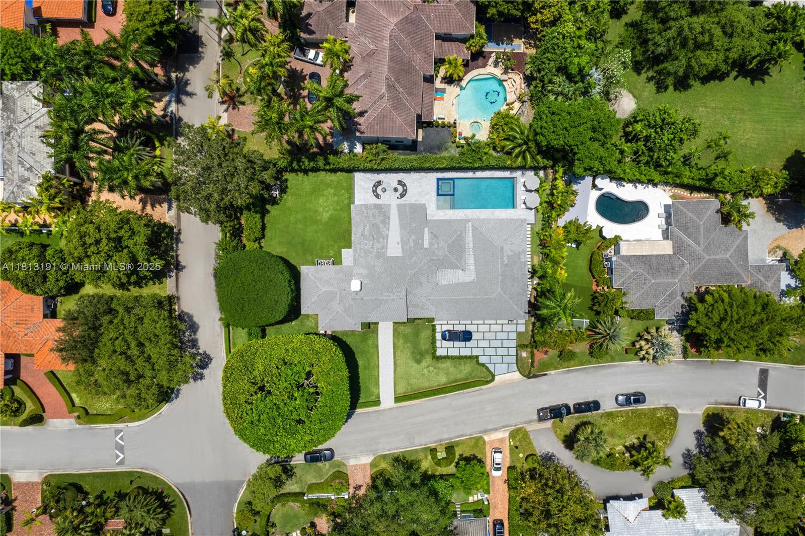 4380 Lake Road Miami, FL 33137 - Photo 2 of 41 an aerial view of a house with large garden and swimming pool