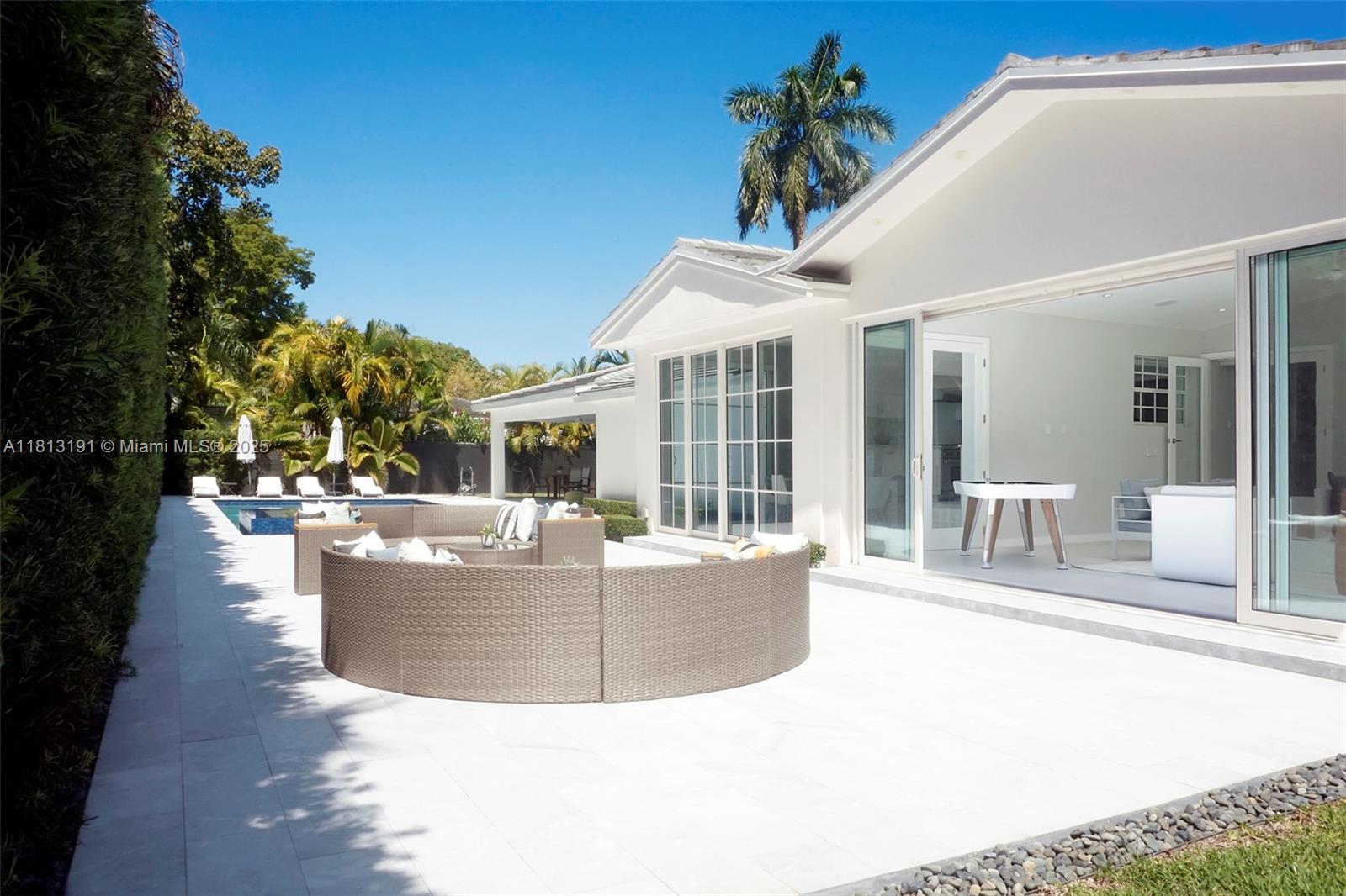 4380 Lake Road Miami, FL 33137 - Photo 4 of 41 a view of a house with backyard and sitting area