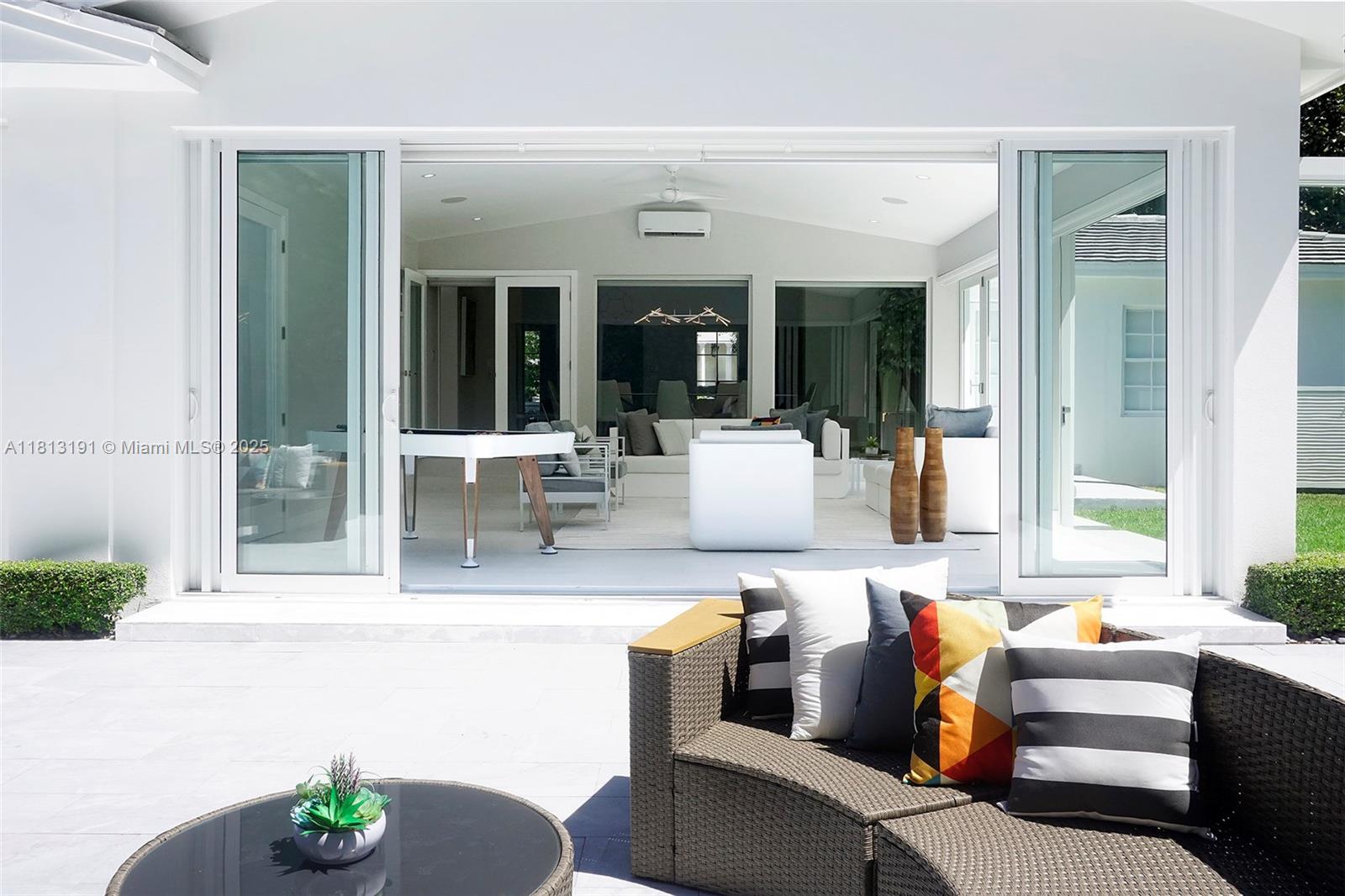 4380 Lake Road Miami, FL 33137 - Photo 5 of 41 a living room with furniture and window