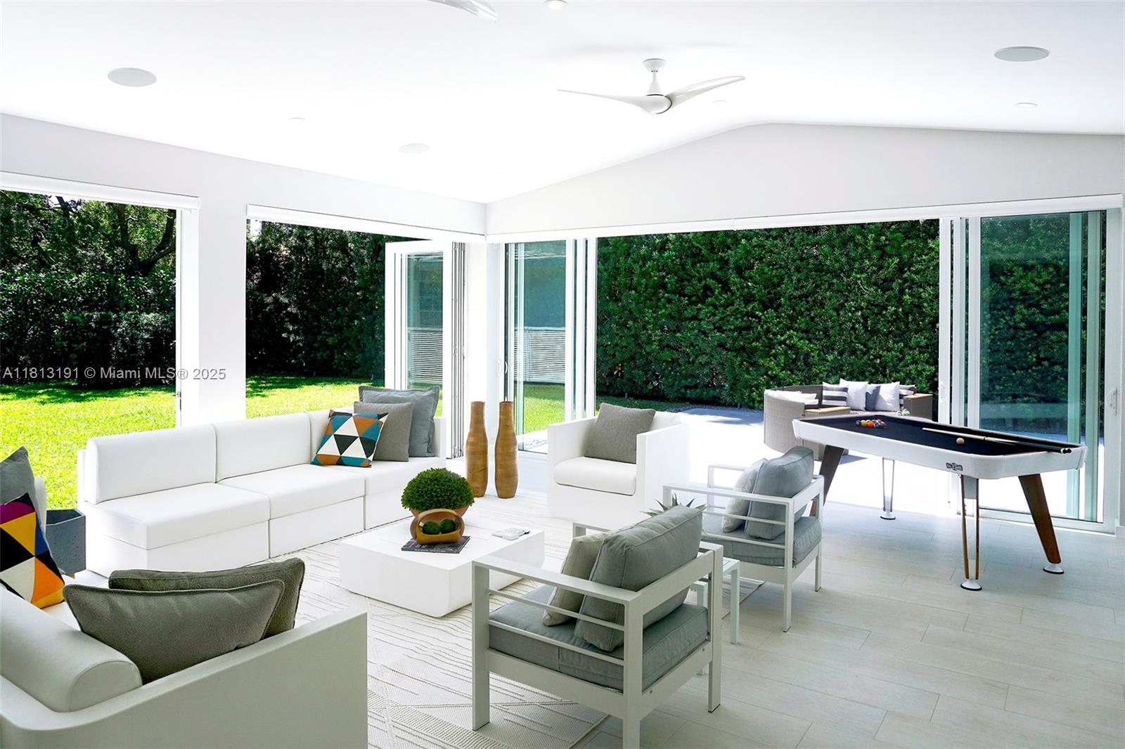 4380 Lake Road Miami, FL 33137 - Photo 6 of 41 a living room with furniture and a large window