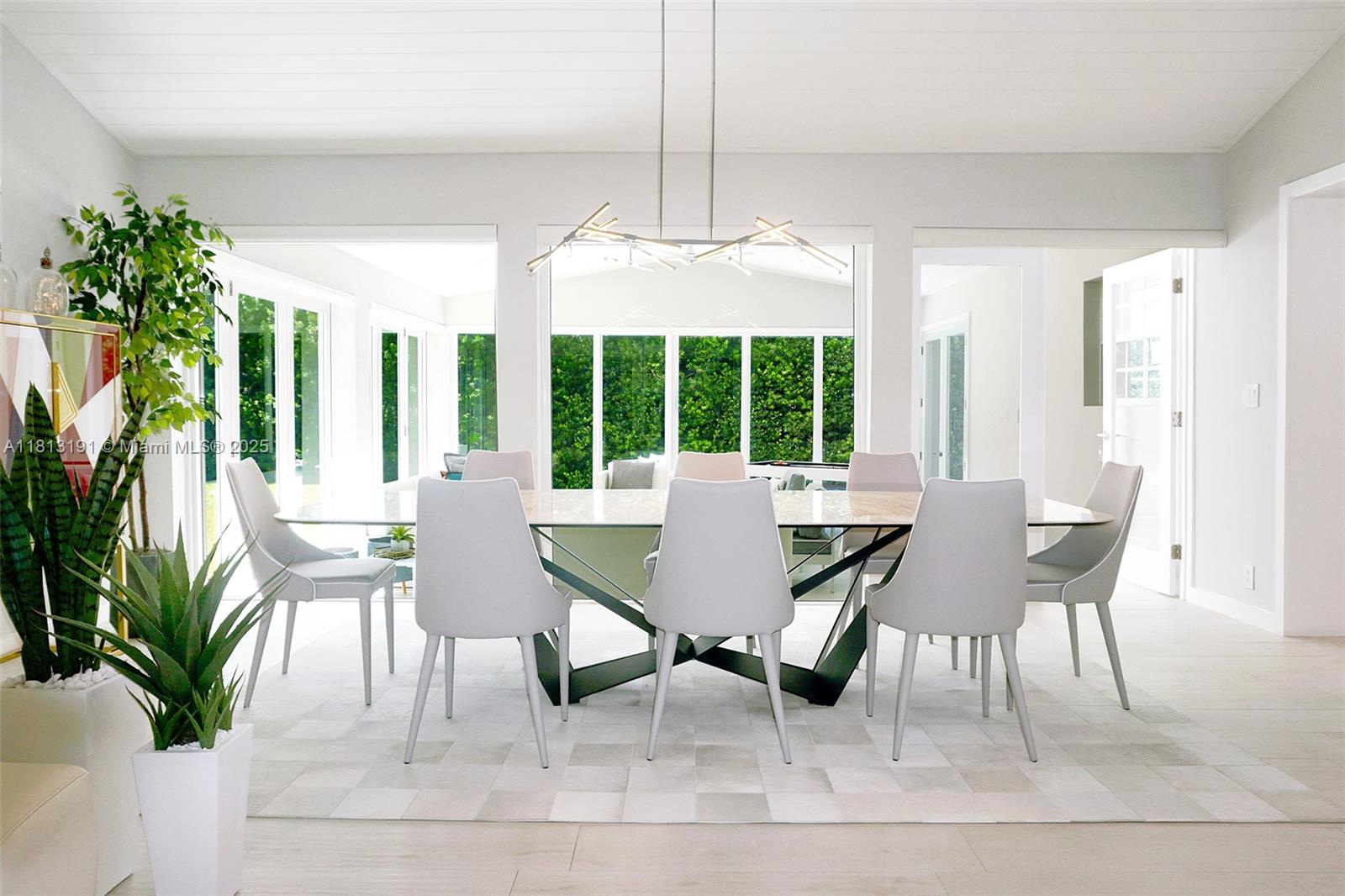 4380 Lake Road Miami, FL 33137 - Photo 7 of 41 a view of a dining room with furniture window and outside view