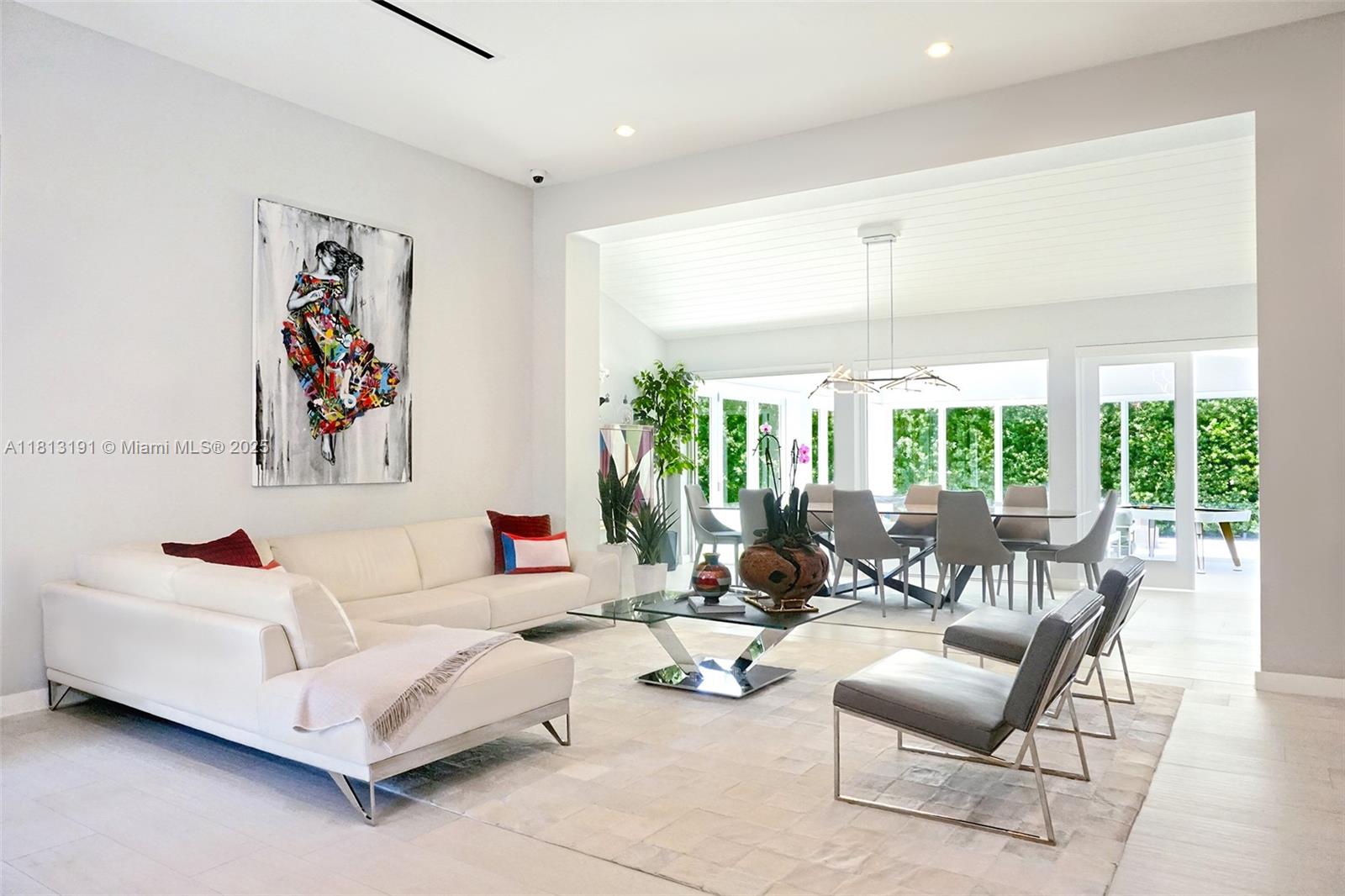 4380 Lake Road Miami, FL 33137 - Photo 8 of 41 a living room with furniture and large windows